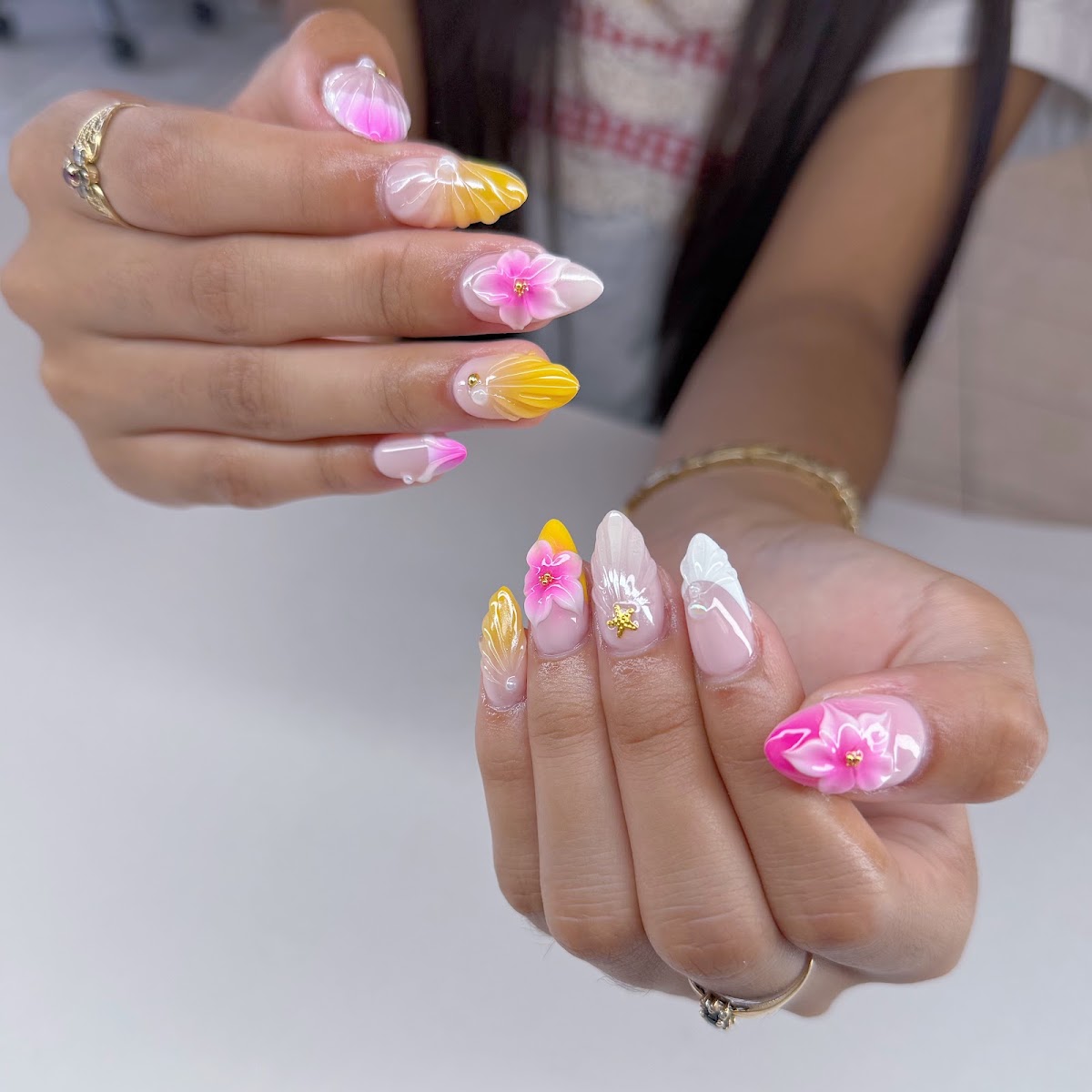 Sculpted 3D pink florals and yellow shells with gold beads