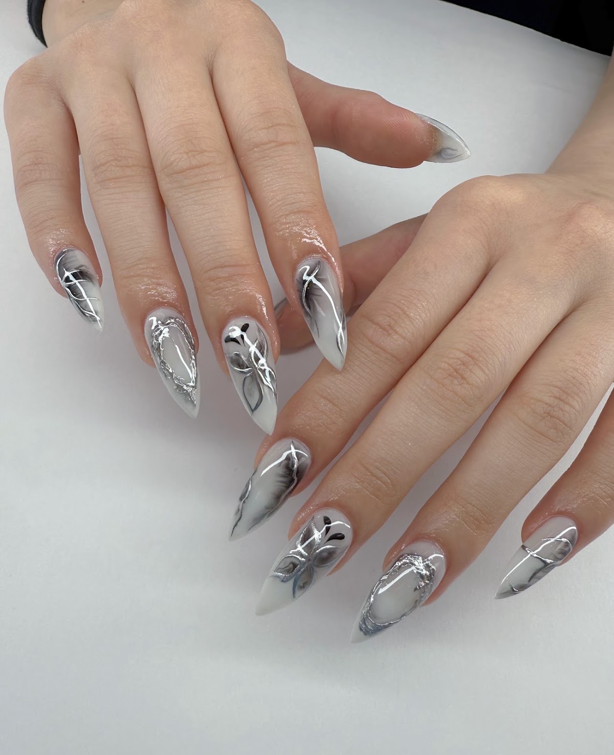 Monochrome smoke marble nails with silver chrome linework